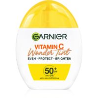 Garnier Vitamin C Wonder Tint ελαφρύ τονωτικό υγρό SPF 50+ απόχρωση Muedium 40 ml