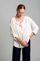 Ecru blouse with gold print