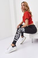 Fitted leggings with black lettering