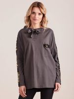 Blouse decorated with anthracite sequins