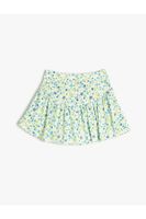 Koton Shorts with a skirt with floral ruffles and an elasticated waist with a ribbed waist.