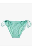 Koton Textured Bikini Bottoms Normal Waist Tie Detail on the sides.