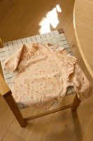 Liewood Detský podbradník Liewood Merle Ruffle Cape Bib