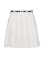 Tommy Jeans Sukňa - TJW LOGO WAISTBAND PLEATED MINI biela