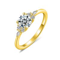 Olivie Strieborný prsteň MOISSANITE GOLD 9843 Velikost prstenů: 6 (EÚ: 51 – 53)