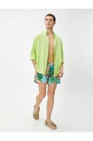 Koton Marine Shorts with a Tropical Print Tie Waist, Pocket Detailed.