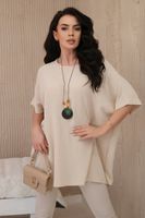 Oversized blouse with pendant in beige color