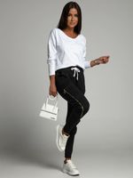 Set of women's cargo pants and a white and black blouse