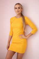 Dress with decorative mustard buttons