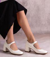 Gemre White pumps with a strap on a block heel lyraa