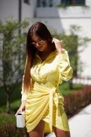 Yellow shirt dress with tie at the front